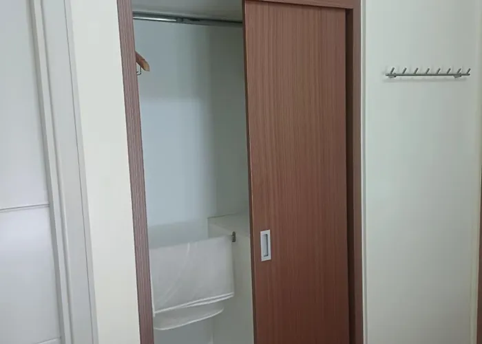 Pasay 1br Family Staycation With Parking In 150 Newport Boulevard Near World & Naia T3 ホテル